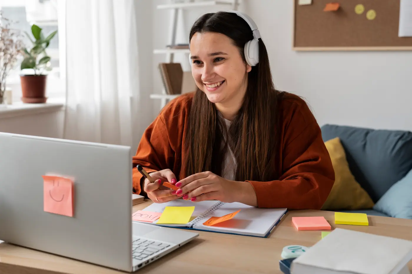Tutor teaching online with laptop and tablet